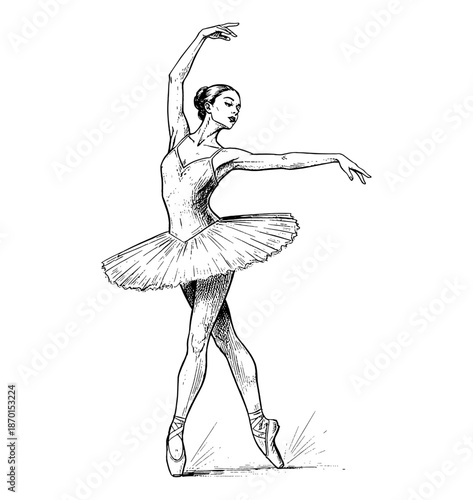 Elegant Caucasian ballerina dancer in graceful pose performing ballet on pointe shoes with focused expression