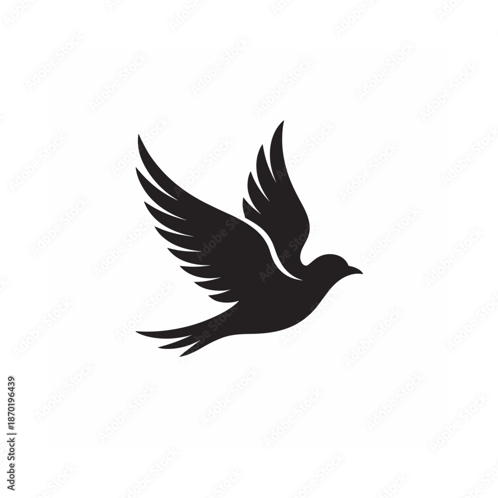 Fototapeta premium A striking black silhouette of a bird in flight wings gracefully spread and soaring