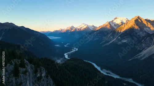 Hiking Through Scenic Valley Panoramic Mountain Range at Sunrise