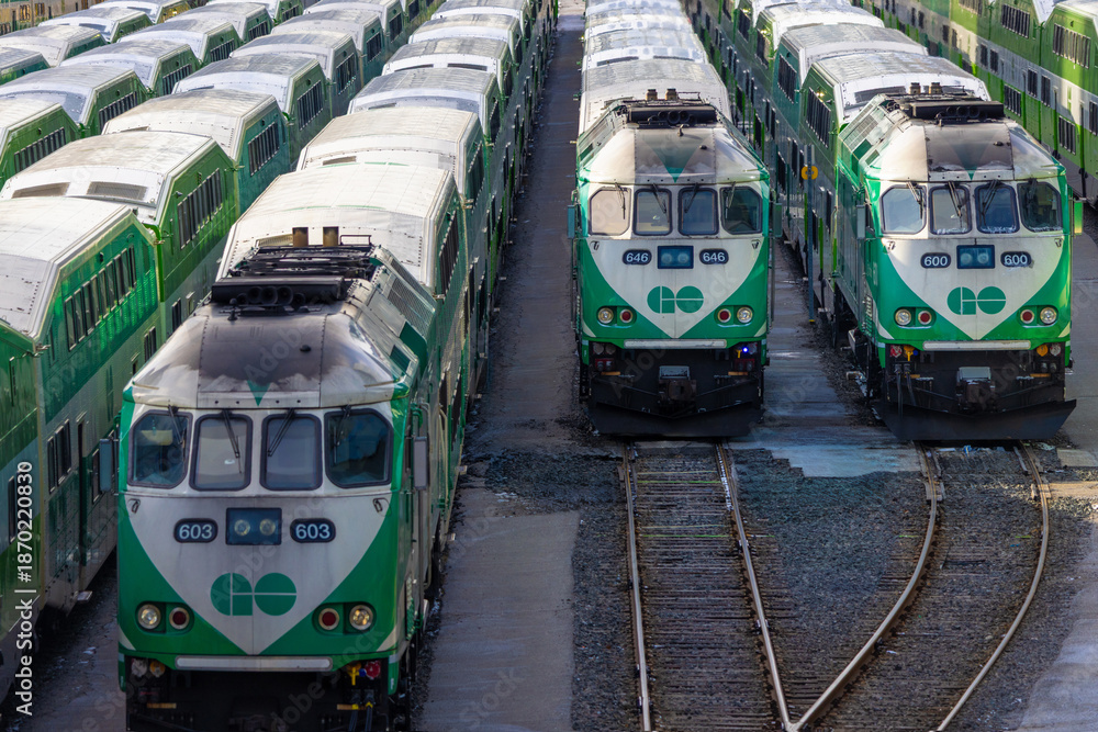 Fototapeta premium Toronto, Ontario, Canada-June 2, 2025: Toronto Go Train arriving at a platform at Union station terminal