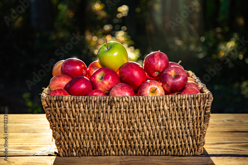 Red apples in basket. Apples organic freshness. Apples in fruits market. Natural organic red Apples with green apple.