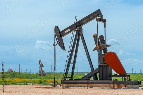 black oil drilling jack in the desert in the USA