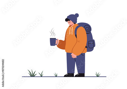 Hiker taking a break enjoying a hot drink.