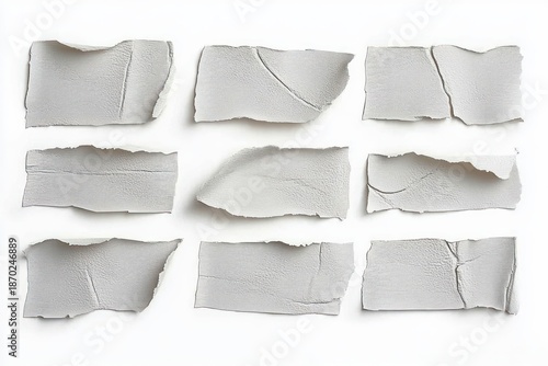 Wallpaper Mural Nine torn textured paper pieces arranged in a neat three by three grid on white background, evoking calm minimalism and orderly simplicity Torontodigital.ca