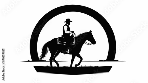 Silhouette of a cowboy riding a horse at sunset.