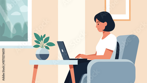 Woman working on laptop at home, focused and productive.