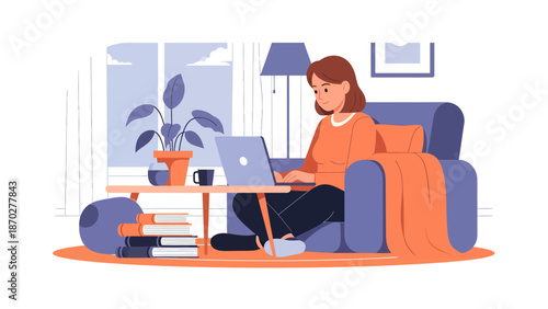 Woman working remotely from home on her laptop.