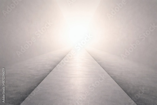 Minimalist abstract pathway leading toward bright light in modern architectural space