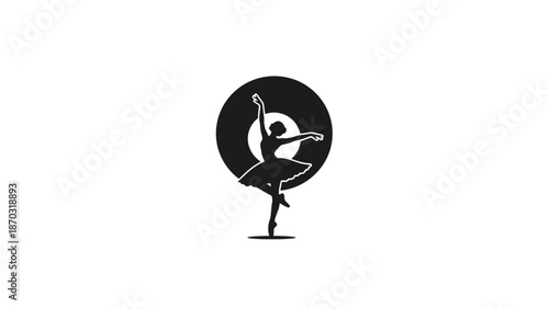 Silhouette of a graceful ballerina performing a dance pose.