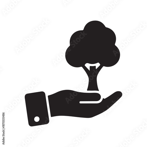 Hand holding a tree symbolizing growth and care for the environment