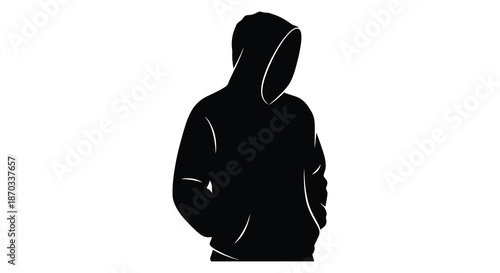 Dark hooded figure stands against a white background showcasing a striking silhouette