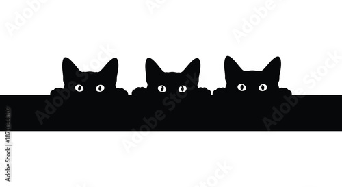 Three feline heads aligned on a dark base a striking image in silhouette