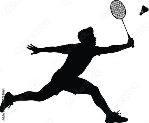 Dynamic silhouette of a male badminton player captured mid action striking a shuttlecock