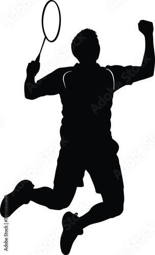 Badminton player in mid air with racket and arm raised, celebrating a victory