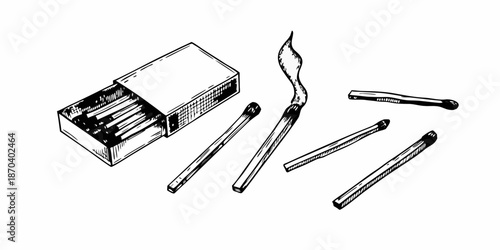 An open matchbox with several matches some lit and some unlit