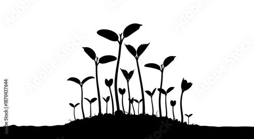 Monochrome silhouettes depicting plant seedlings emerging and growing from the soil
