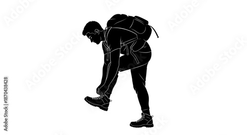 Silhouette of a hiker tying shoelaces on a trail with backpack for adventure preparation