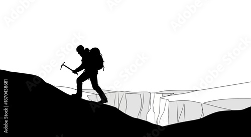 Silhouette of a mountaineer climbing a steep snowy mountain with an ice axe in hand showing