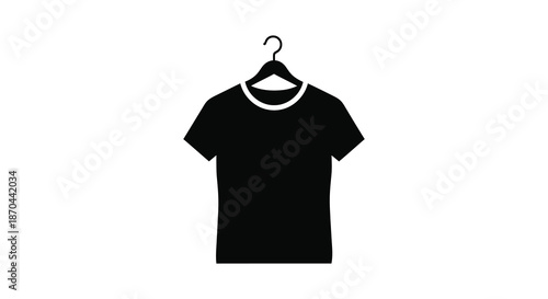 A simple black t shirt hanging on a dark clothes hanger a minimalist silhouette