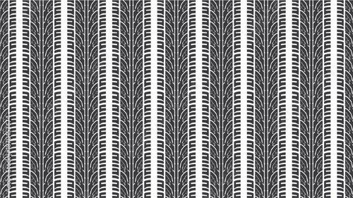 A repeating pattern of vertical black and white tire tracks on a white background, showcasing intricate tread details and a sense of movement.
