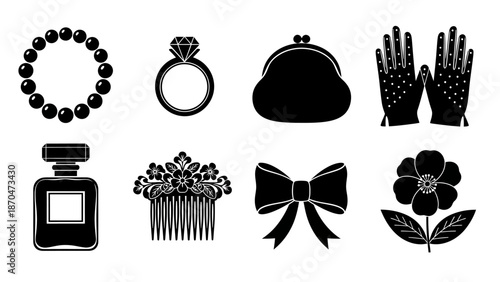 Collection of luxury accessories and beauty items displayed against a neutral background