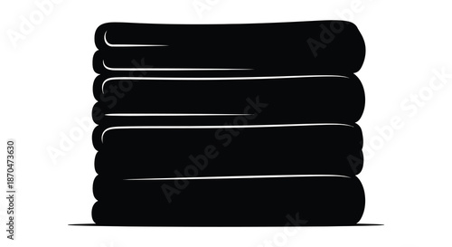 a neatly stacked pile of folded black towels presented against a plain white background silhouette