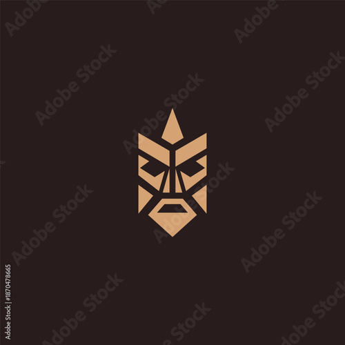 Geometric abstract totem mask logo inspired by ancient symbolism and culture.