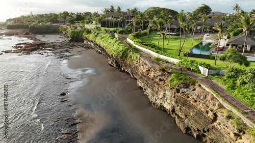 Wallpaper Mural Bali cliff beach with a Hindu temple at Pantai Mengening beach/cliff side with Pura Gede Luhur Batu Ngaus temple located on the small peninsula off the cliffs from the main road.  Torontodigital.ca