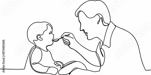 A mother lovingly feeding her baby with a spoon a tender moment