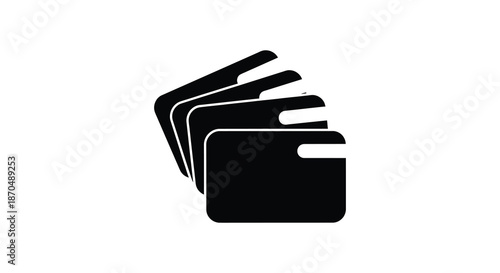 A stack of black film reels depicted as a striking graphic a bold silhouette