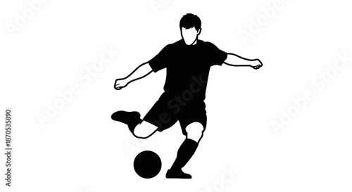 Professional soccer player kicking ball in dynamic action