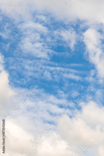 Blue Sky Background with Soft Clouds