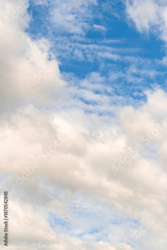 Bright Blue Sky with Fluffy Clouds