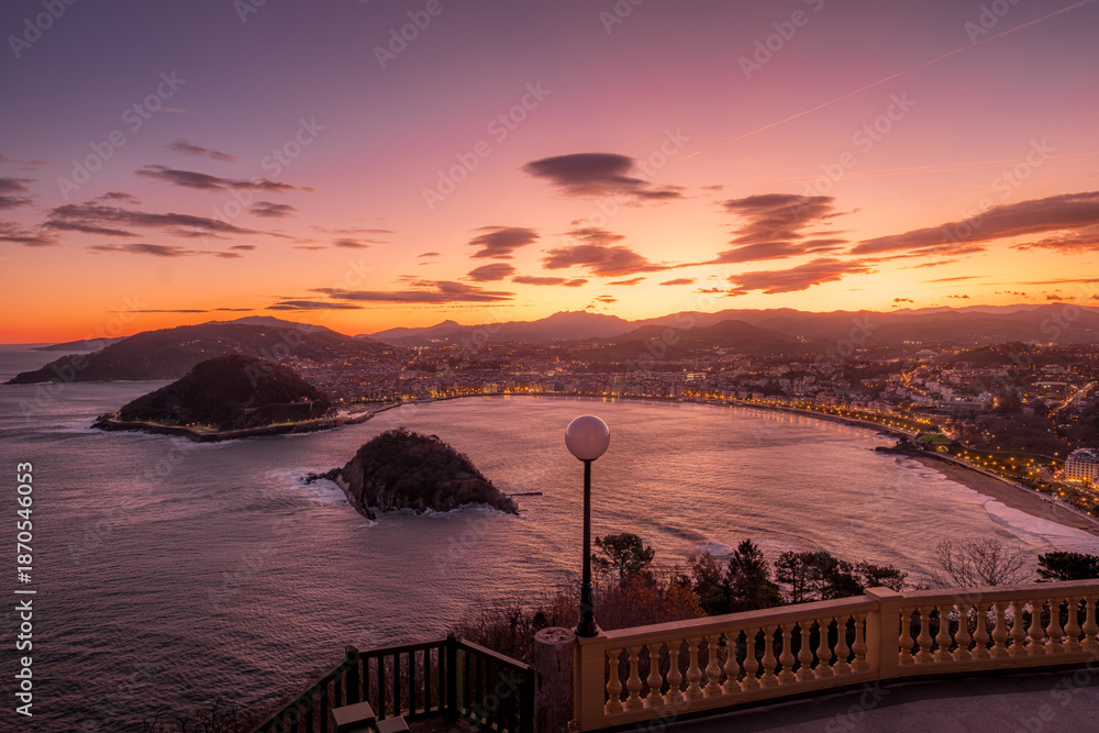 Fototapeta premium Sunset Over La Concha Bay And Santa Clara Island, San Sebastian, Spain