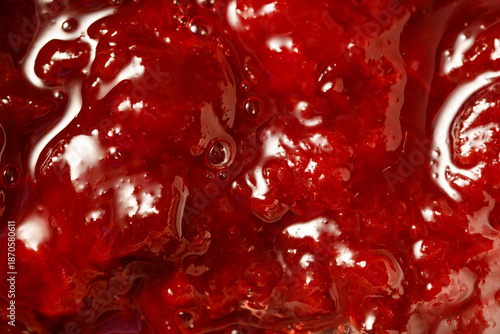 Raspberry jam as an abstract background. Close-up