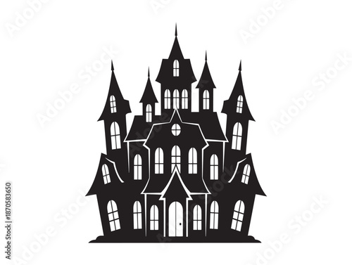 Silhouette of a spooky haunted mansion with multiple towers and gothic architectural details