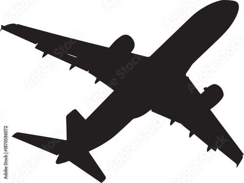 Silhouette of commercial airplane in flight viewed from below