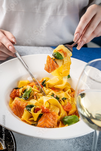 Greek Style Salmon Pasta Served With White Wine