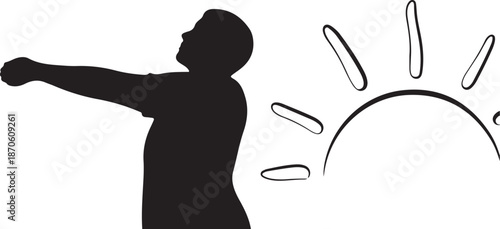 Man throwing stone at sunrise silhouette