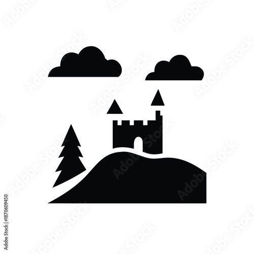 Ancient castle silhouette on a hilltop with clouds
