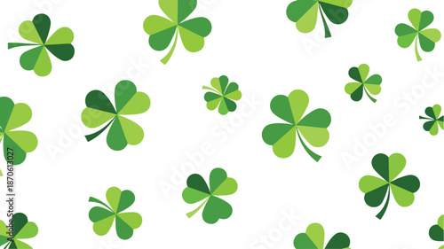 A vibrant pattern of assorted green shamrocks on a white background viewed from directly above