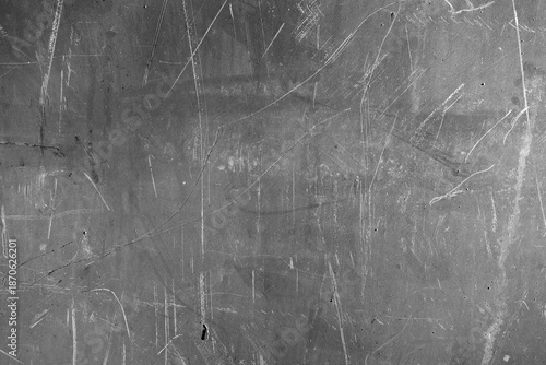 Rusted scratched grungy metal sheet texture.