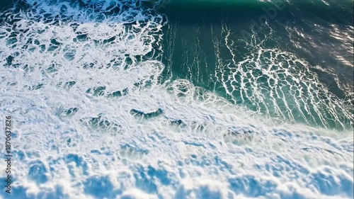 Aerial View of Crashing Ocean Waves and White Sea Foam