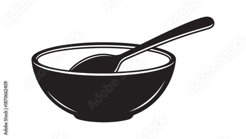 A simple bowl with a spoonful of food ready to eat on a kitchen counter, everyday meal scene.