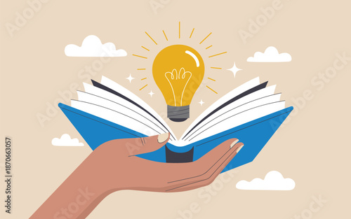 An open book with a glowing lightbulb emerging from its pages, held gently in a hand against a serene sky-blue background with white clouds.
