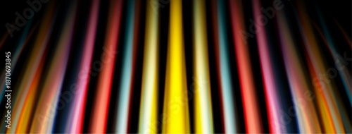 Abstract vertical lines dominate image. Colors blend, creating dynamic visual effect. Black background emphasizes bright streaks.
