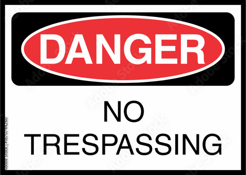 A warning sign indicating danger and no trespassing allowed.