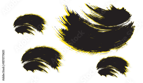 Dynamic black and yellow grunge brush strokes with textured organic shapes for artistic design use