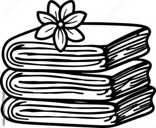 Stack of folded towels with flower on top clean, soft fabric linens for bath and spa