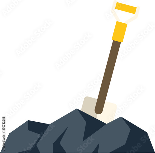 Shovel is digging into a pile of coal for a mining or energy concept
